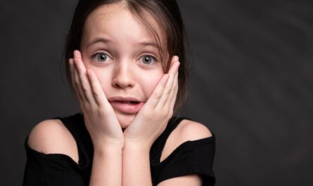 Girl in Black Top Looking Surprised