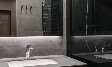 Stylish bathroom with glass elements in apartment